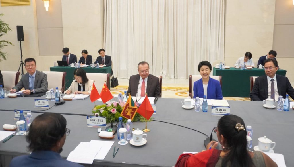 Tilwin Silva and the team at the headquarters of the Foreign Affairs Department of the Communist Party of China