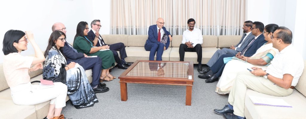 Tilvin Silva and the team chatting with High Commissioner of the United Nations Commission on Human Rights