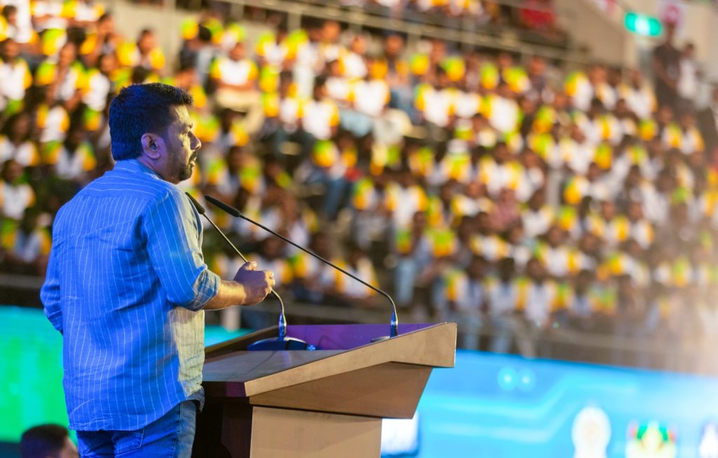 President Addressing The National Youth Conference from back
